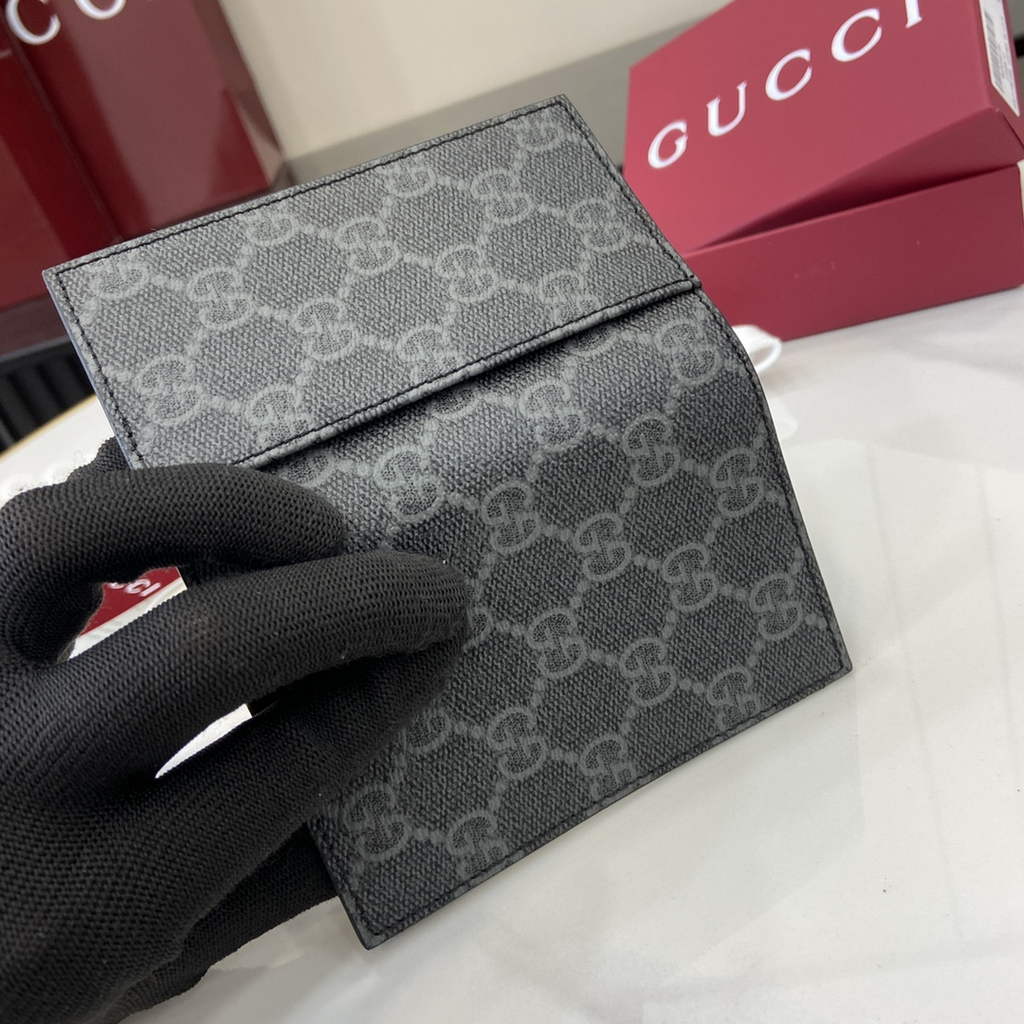 Gucci GG Emblem bi-fold card case, 821209 in black fabric