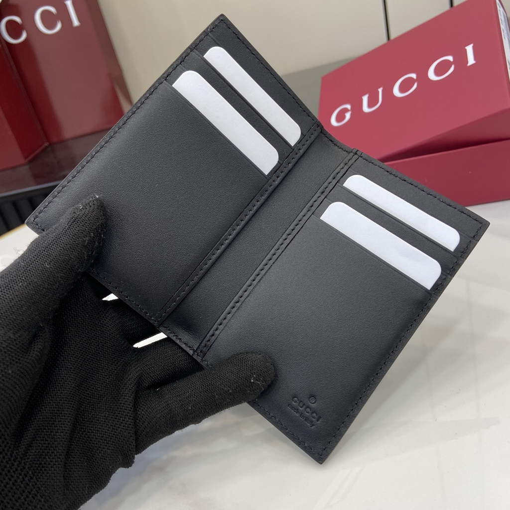Gucci GG Emblem bi-fold card case, 821209 in black fabric