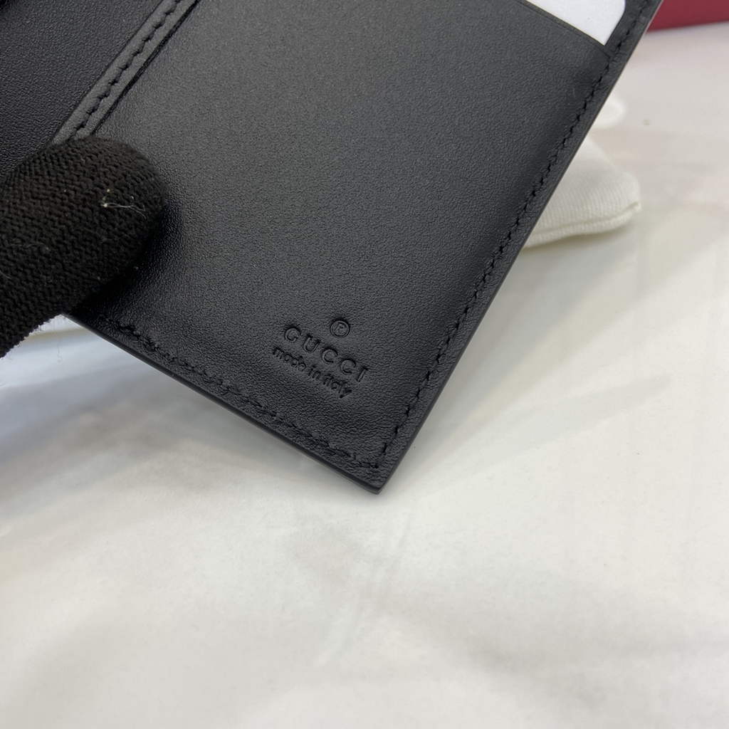 Gucci GG Emblem bi-fold card case, 821209 in black fabric