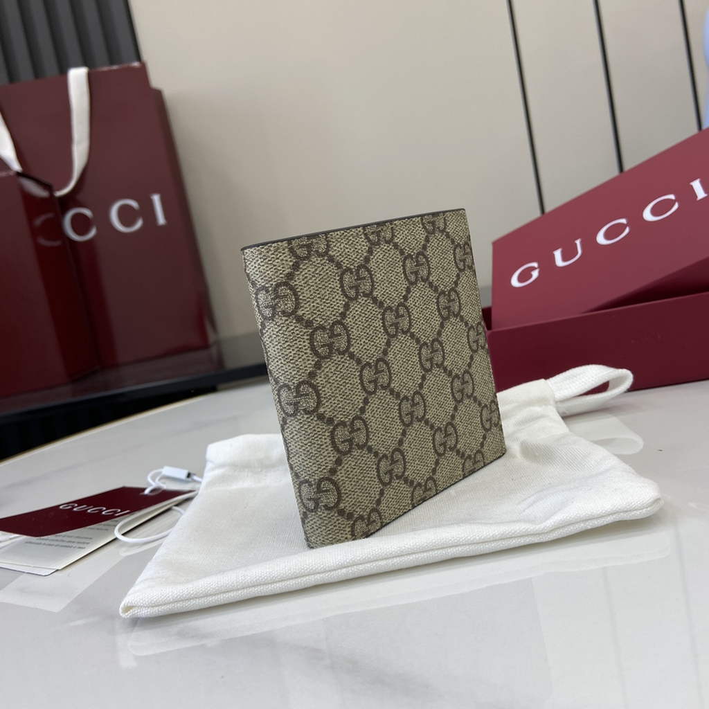 Gucci GG Emblem bi-fold wallet, 821206 in beige fabric