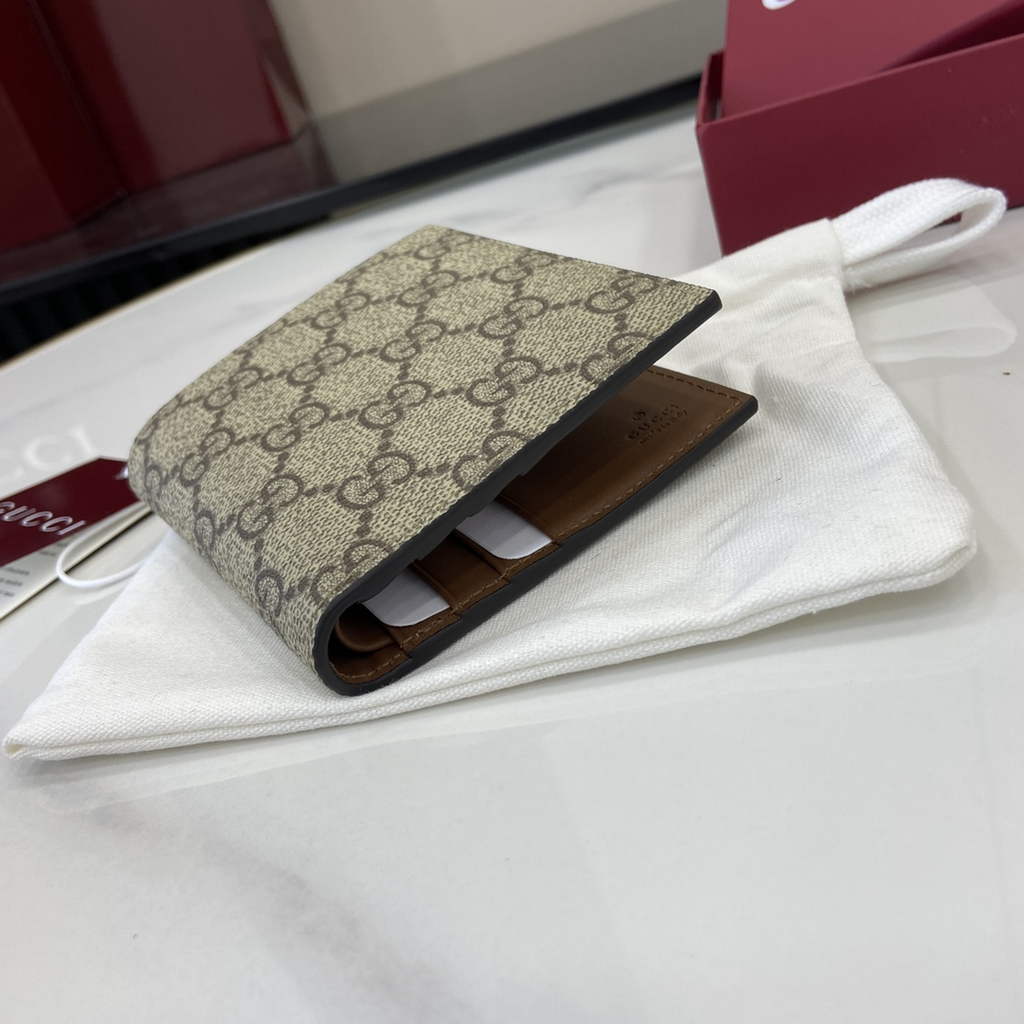 Gucci GG Emblem bi-fold wallet, 821206 in beige fabric