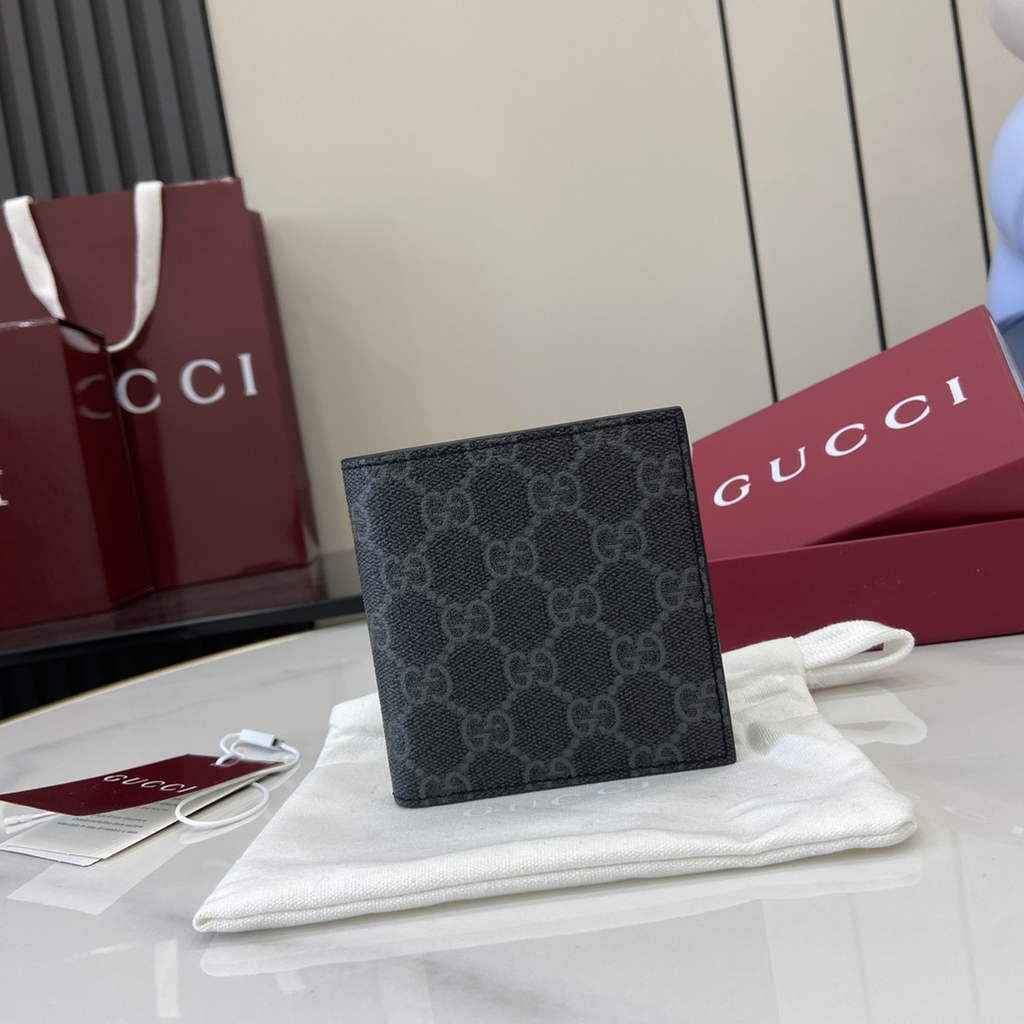 Gucci GG Emblem bi-fold wallet, 821206 in black fabric