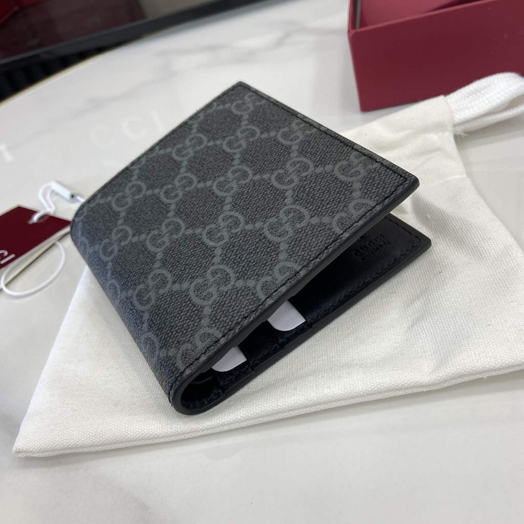 Gucci GG Emblem bi-fold wallet, 821206 in black fabric