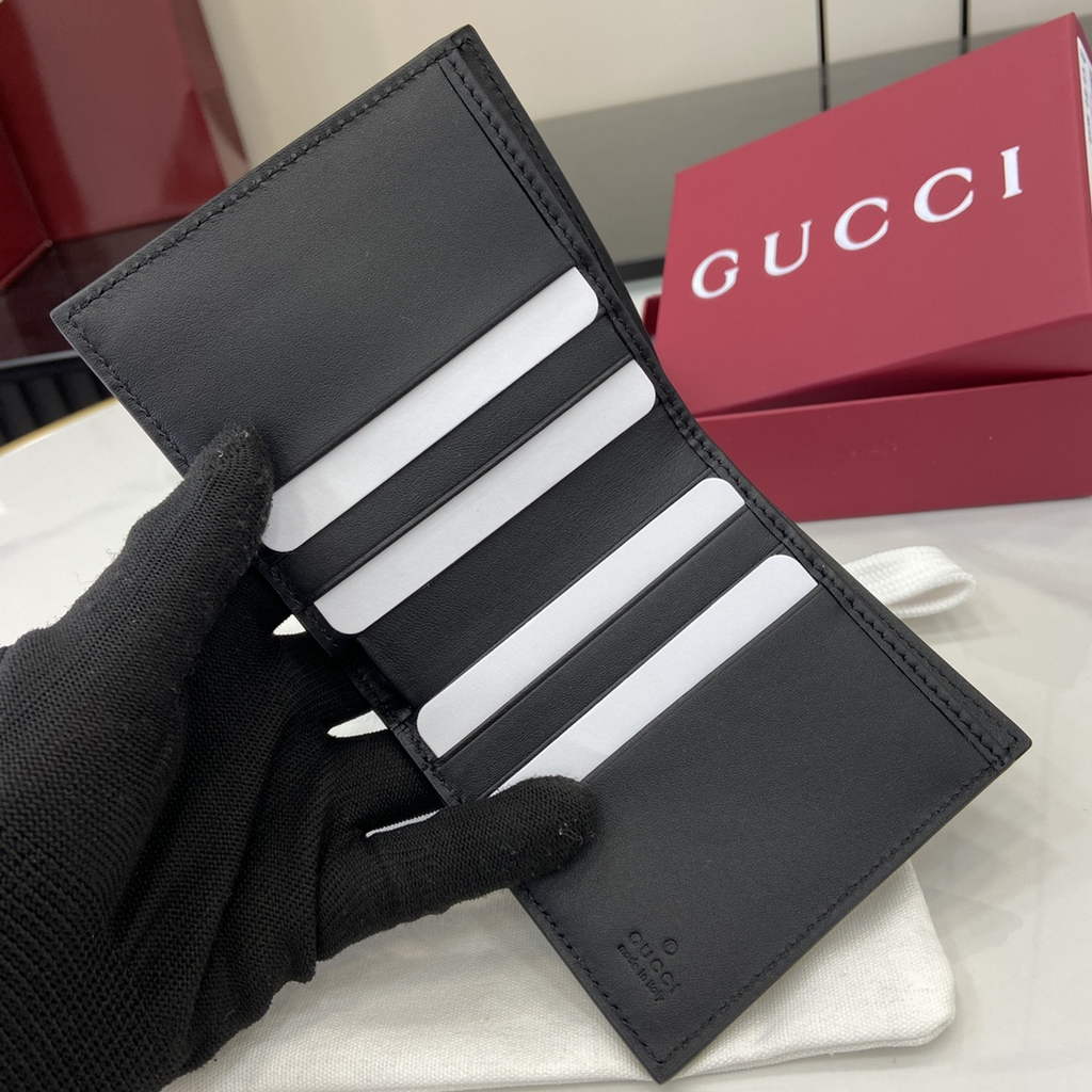 Gucci GG Emblem bi-fold wallet, 821206 in black fabric