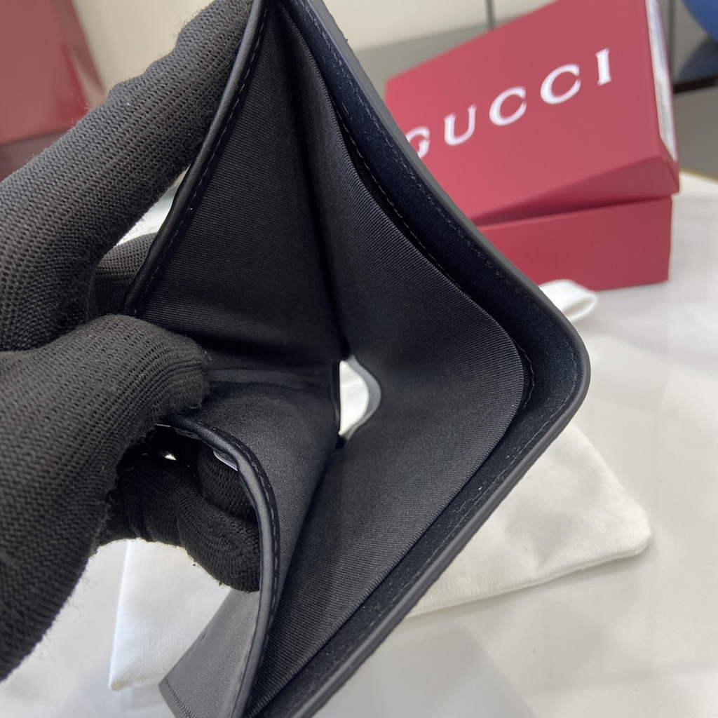 Gucci GG Emblem bi-fold wallet, 821206 in black fabric