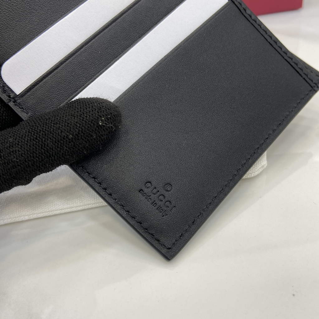Gucci GG Emblem bi-fold wallet, 821206 in black fabric