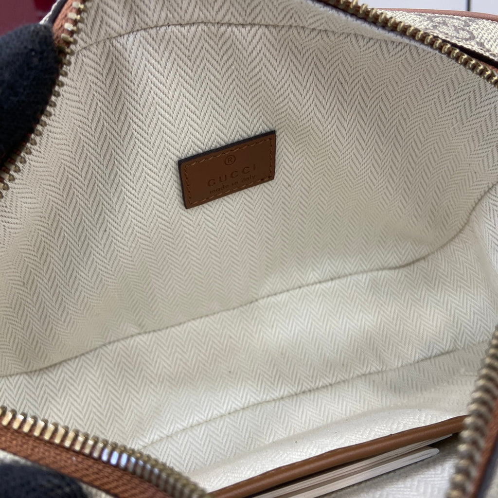 Gucci GG Emblem embossed super mini bag, 821216 in beige fabric