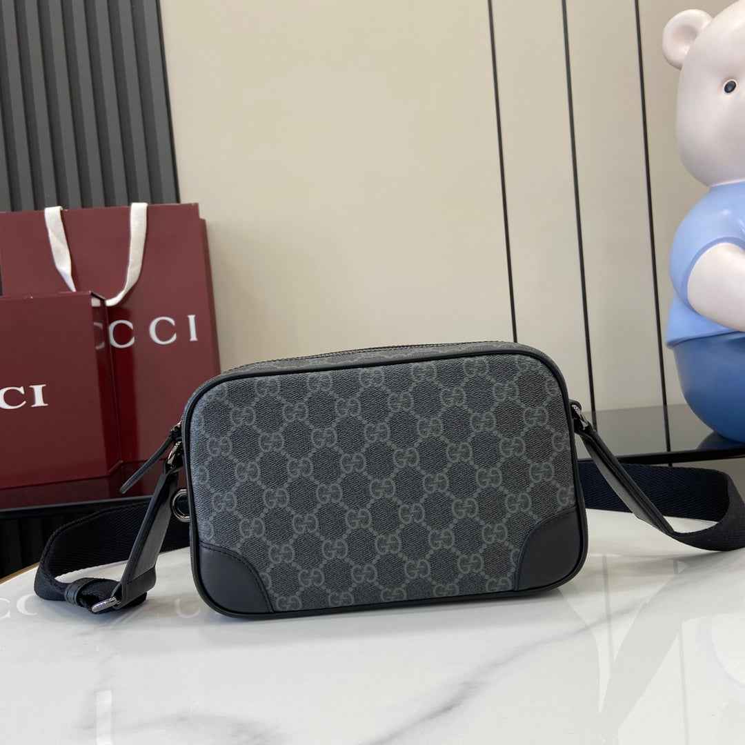 Gucci GG Emblem embossed super mini bag, 821216 in black fabric