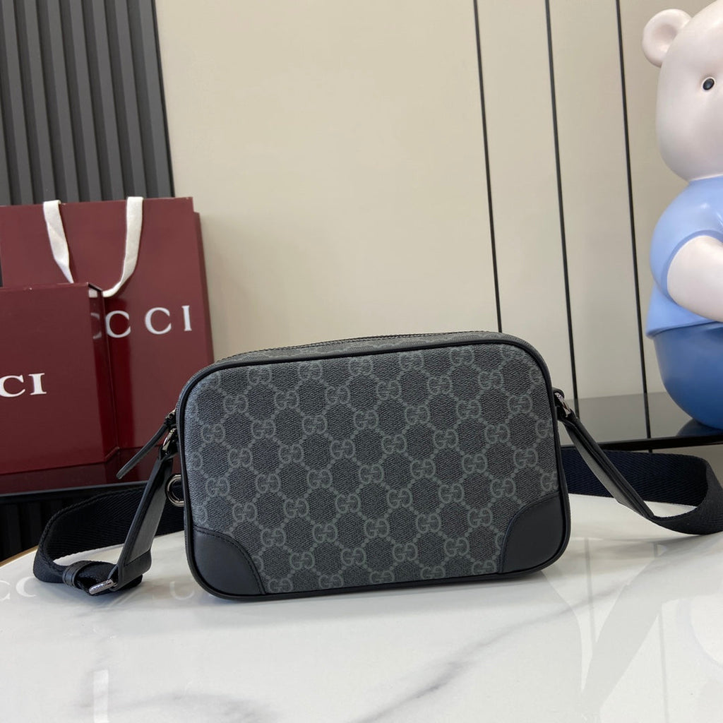 Gucci GG Emblem embossed super mini bag, 821216 in black fabric