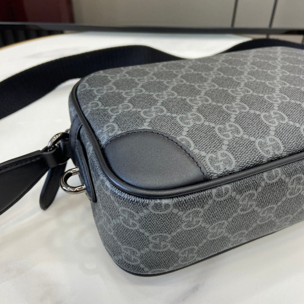 Gucci GG Emblem embossed super mini bag, 821216 in black fabric