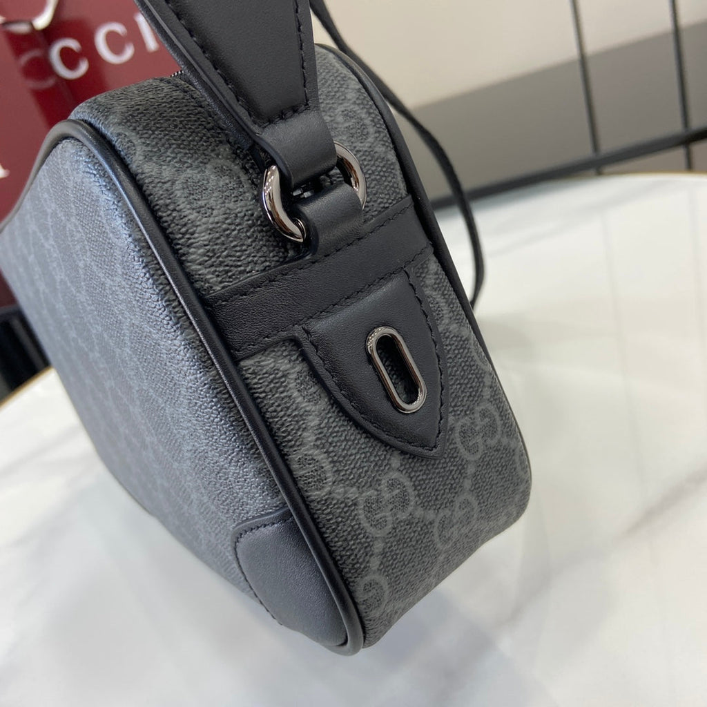 Gucci GG Emblem embossed super mini bag, 821216 in black fabric