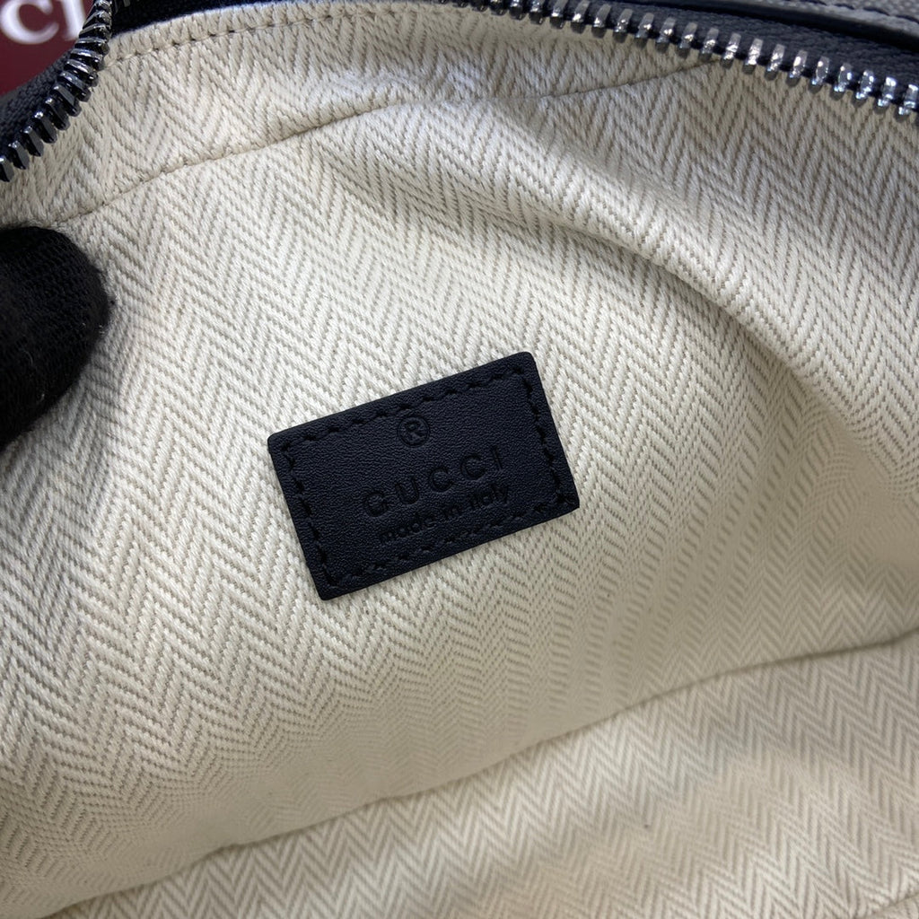 Gucci GG Emblem embossed super mini bag, 821216 in black fabric