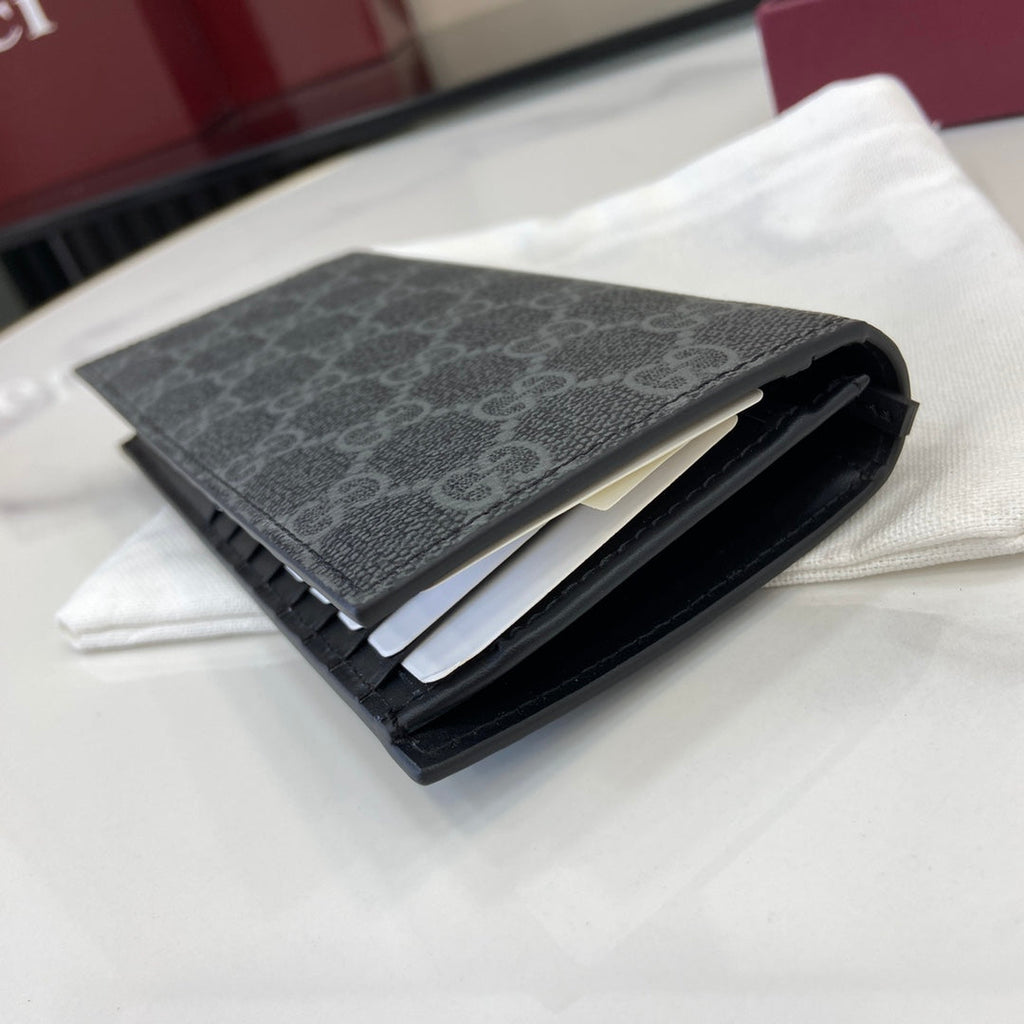 Gucci GG Emblem long wallet, 821213 in black fabric