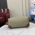 Gucci GG Emblem medium toiletry case, ‎821163 in beige fabric
