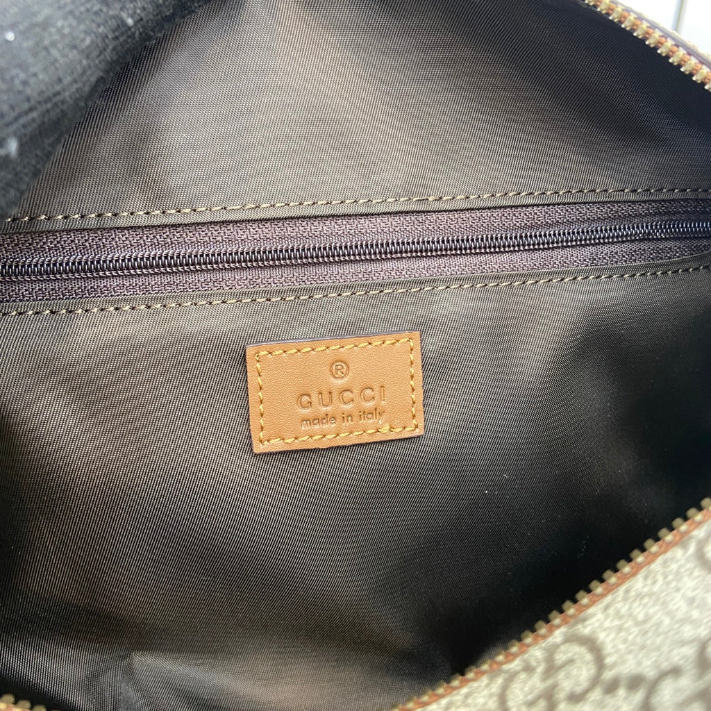 Gucci GG Emblem medium toiletry case, ‎821163 in beige fabric