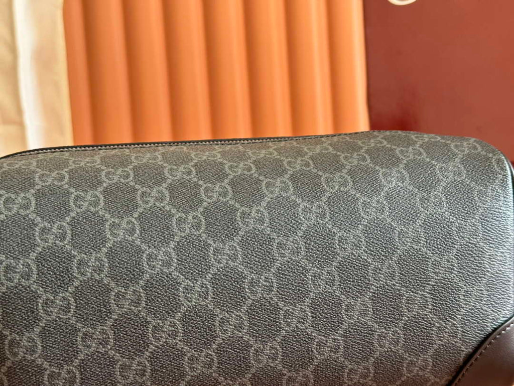 Gucci GG Emblem medium toiletry case, ‎821163 in black fabric