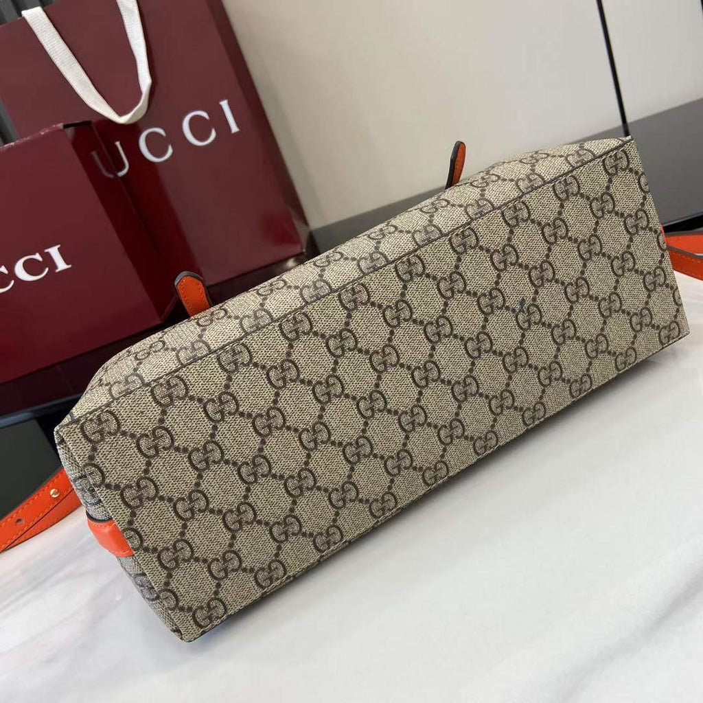 Gucci GG Emblem medium tote bag 815214 in orange fabric