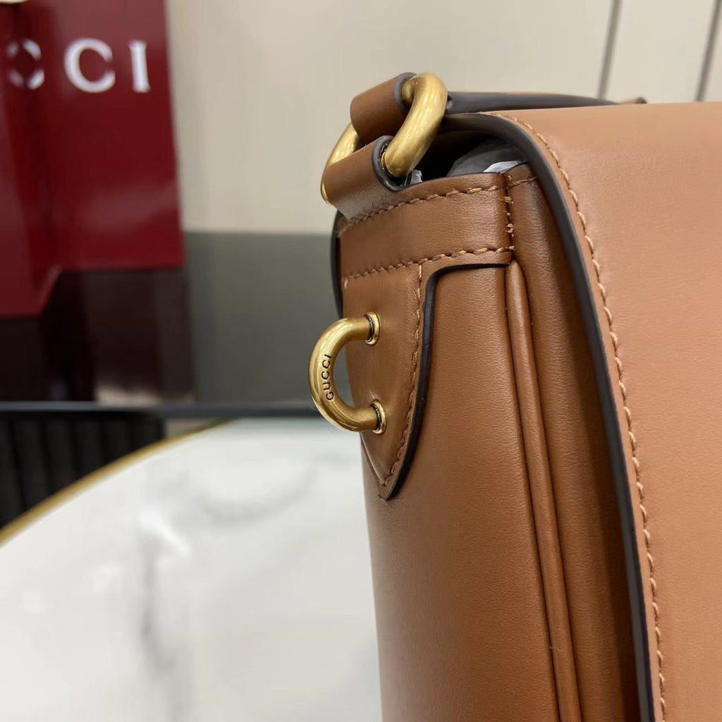 Gucci GG Emblem medium crossbody bag 821154 in brown leather