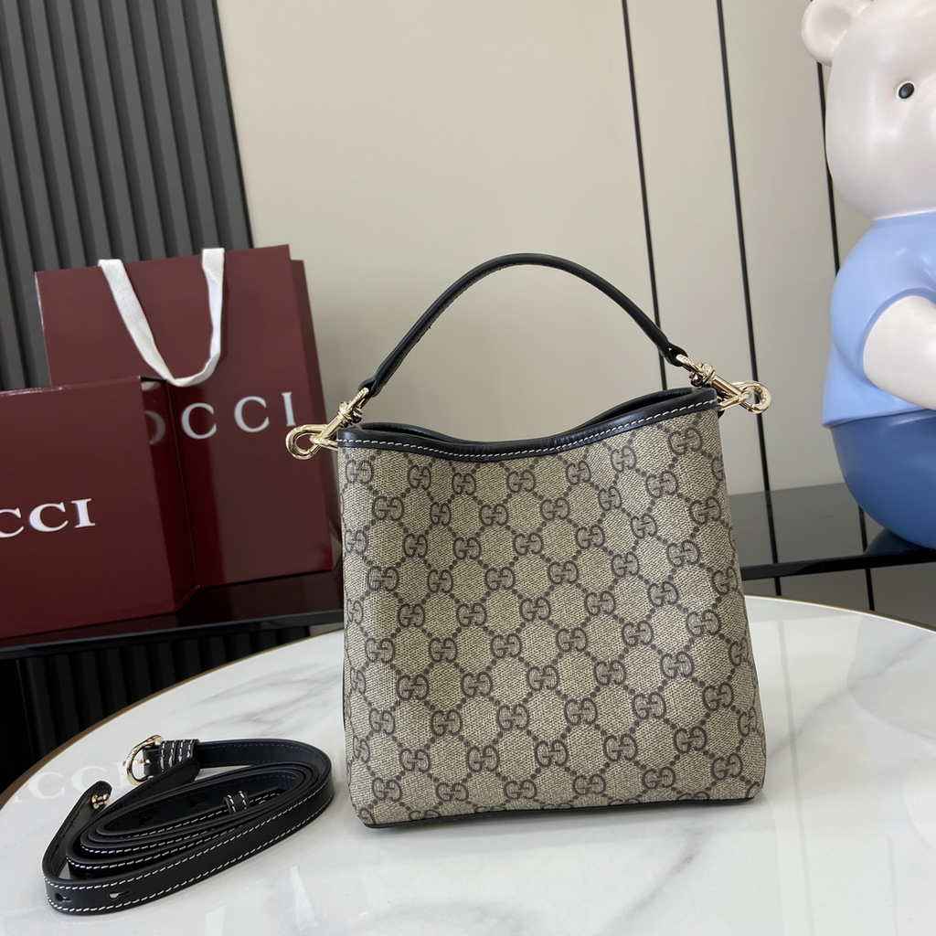 Gucci GG Emblem small bucket bag 815118 in beige and black fabric