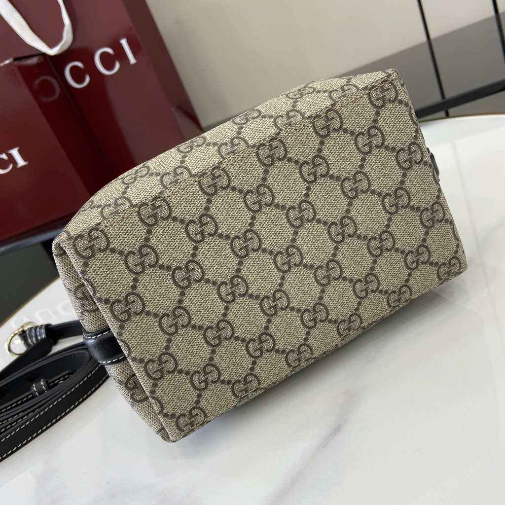 Gucci GG Emblem small bucket bag 815118 in beige and black fabric