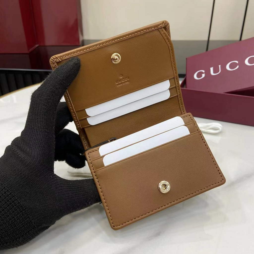 Gucci GG Emblem mini wallet, 820692 in blue and ivory GG denim
