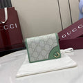 Gucci GG Emblem mini wallet, 820692 in green leather