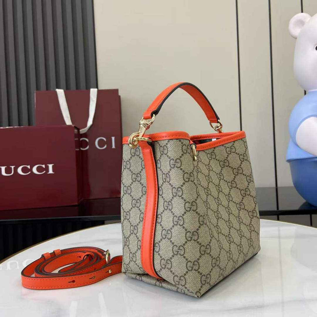 Gucci GG Emblem small bucket bag 815118 in orange fabric