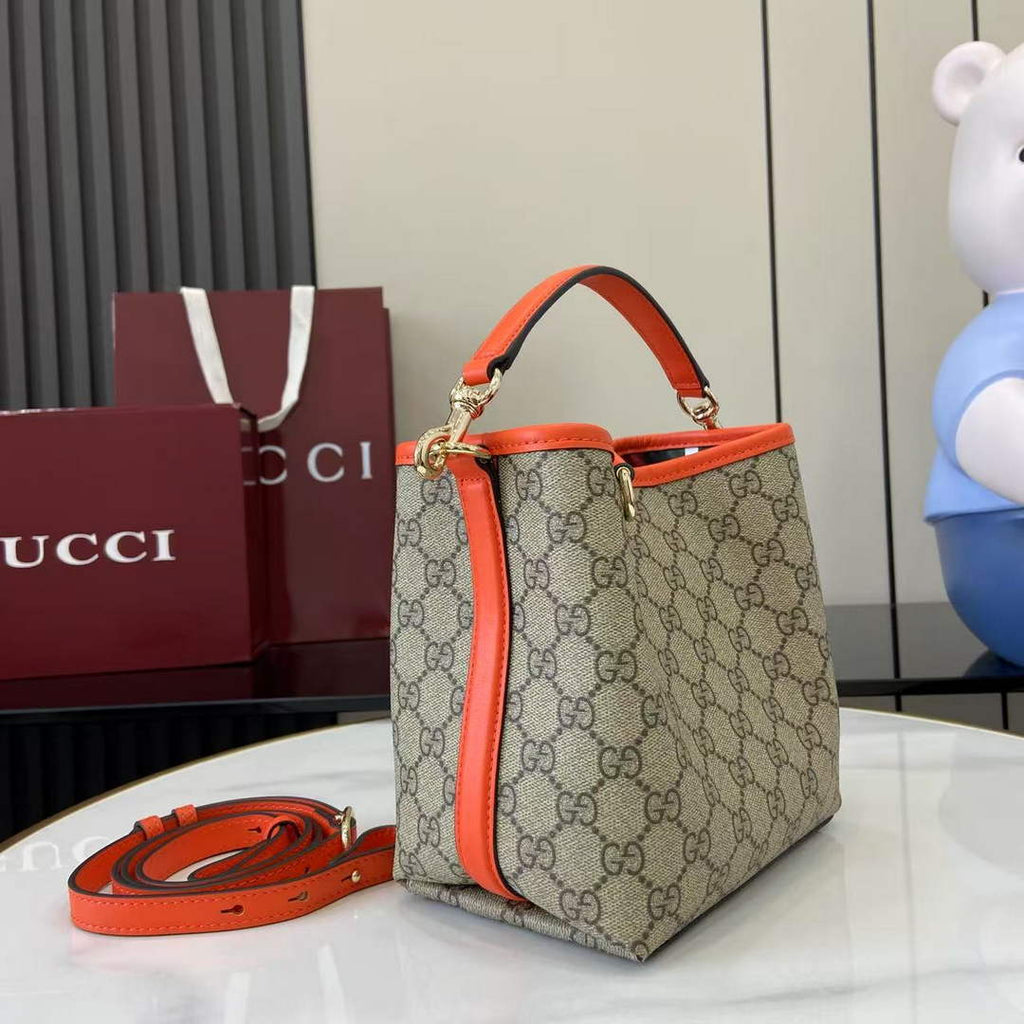 Gucci GG Emblem small bucket bag 815118 in orange fabric