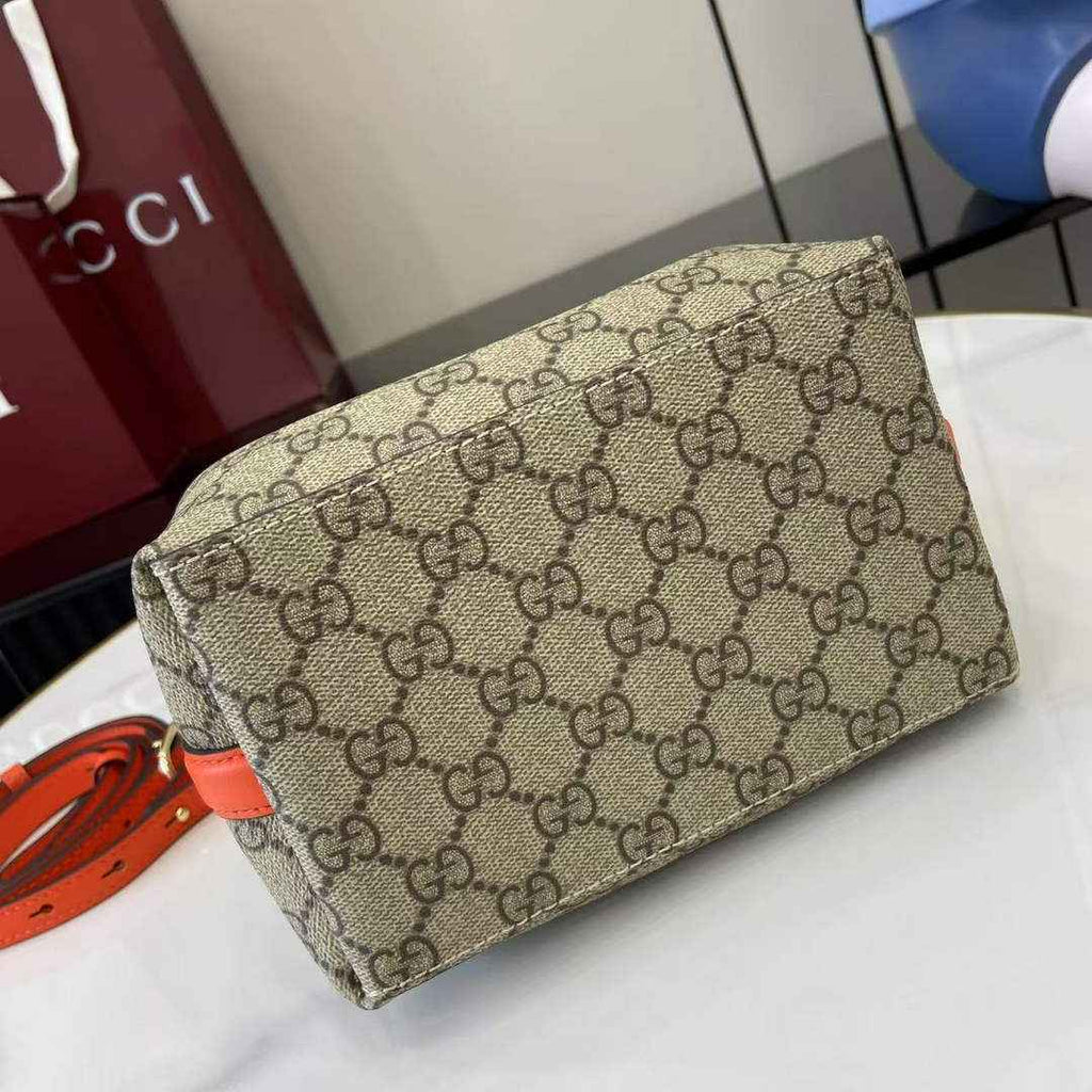 Gucci GG Emblem small bucket bag 815118 in orange fabric