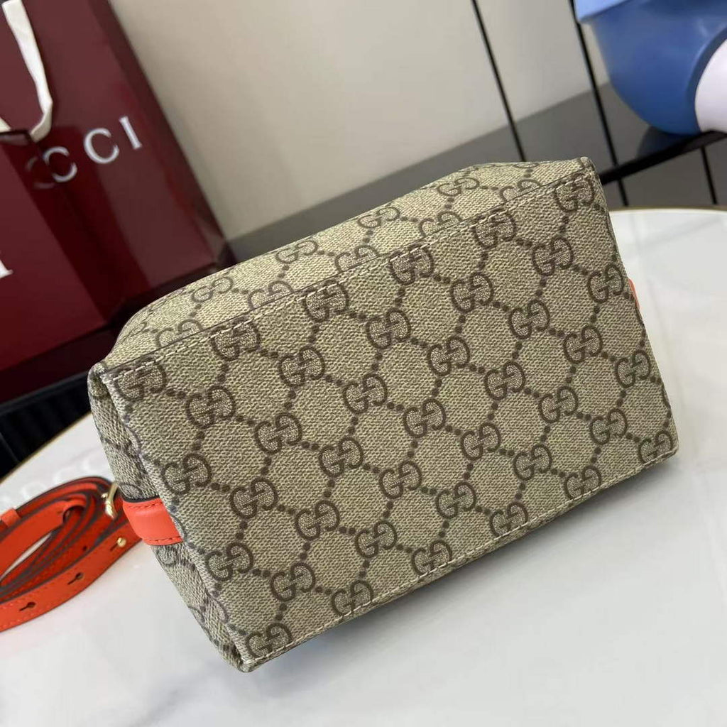 Gucci GG Emblem small bucket bag 815118 in orange fabric