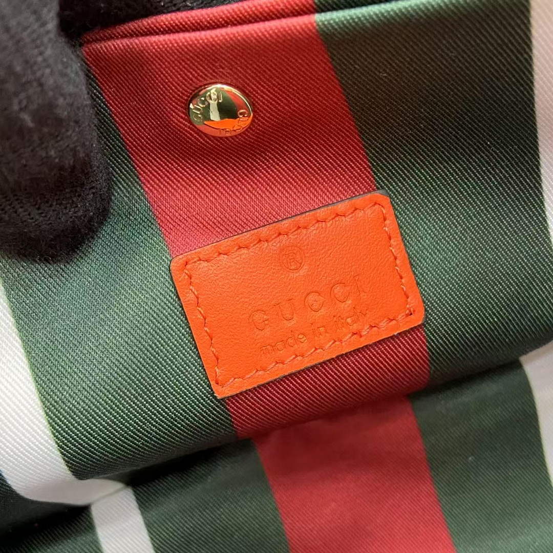 Gucci GG Emblem small bucket bag 815118 in orange fabric
