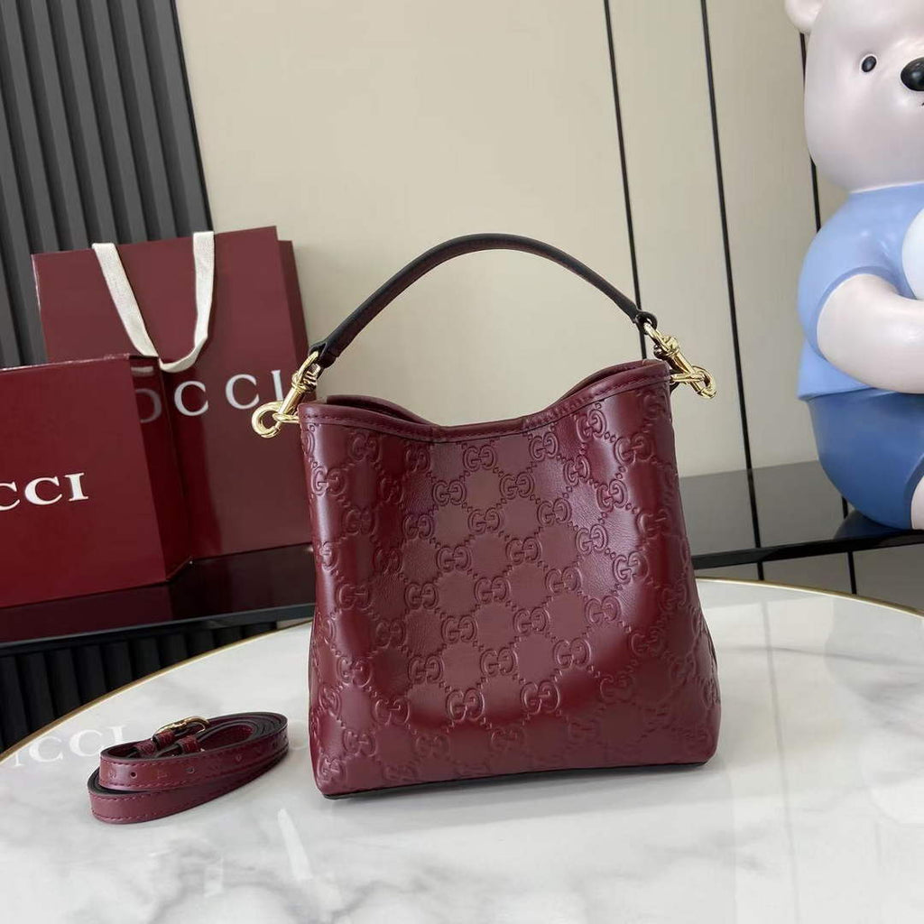 Gucci GG Emblem small bucket bag 815118 in GG wine red leather