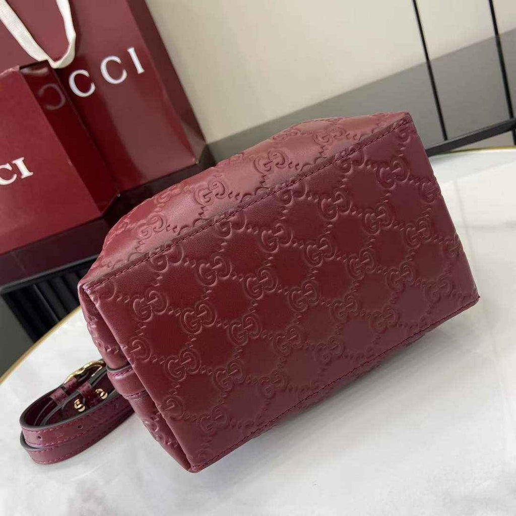 Gucci GG Emblem small bucket bag 815118 in GG wine red leather