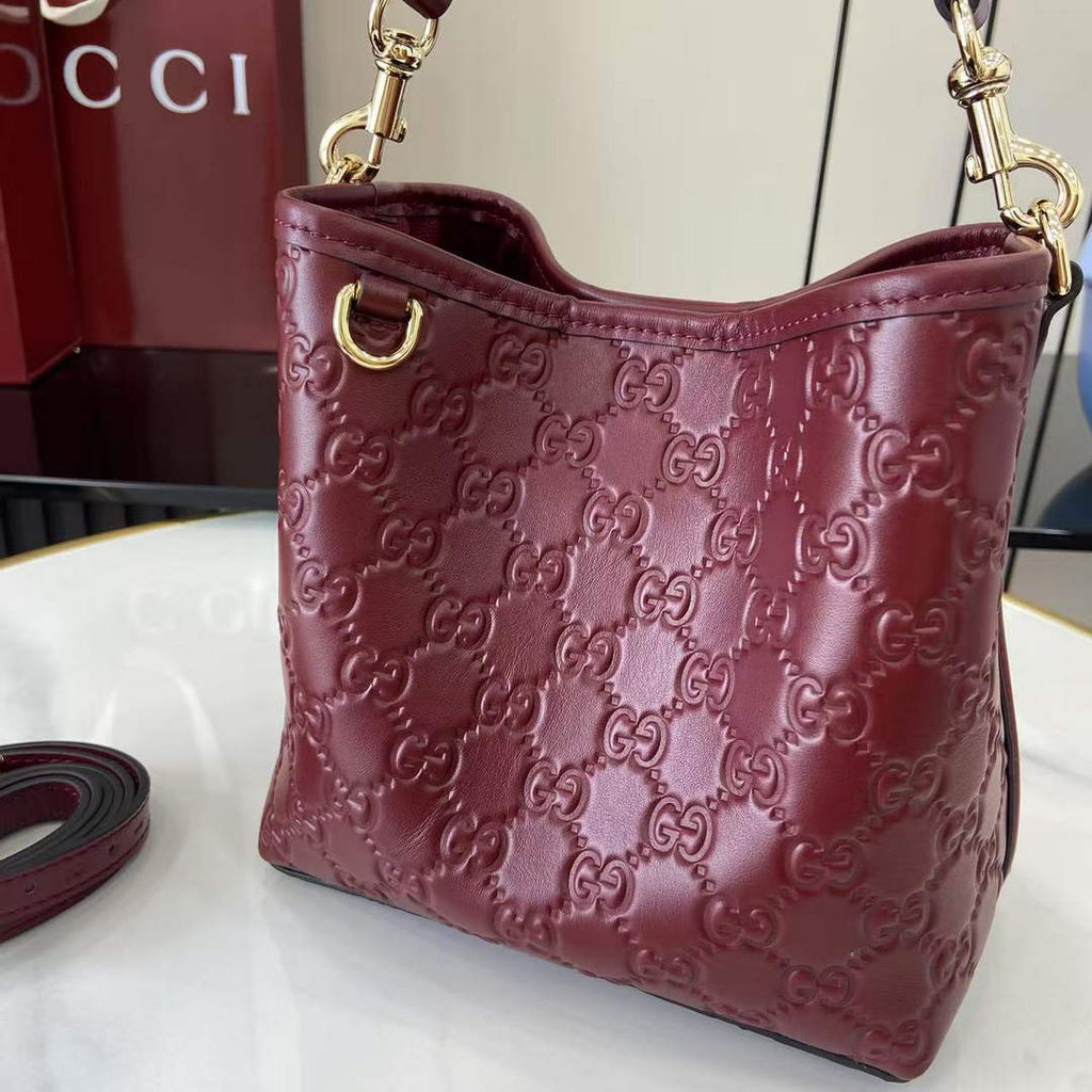 Gucci GG Emblem small bucket bag 815118 in GG wine red leather