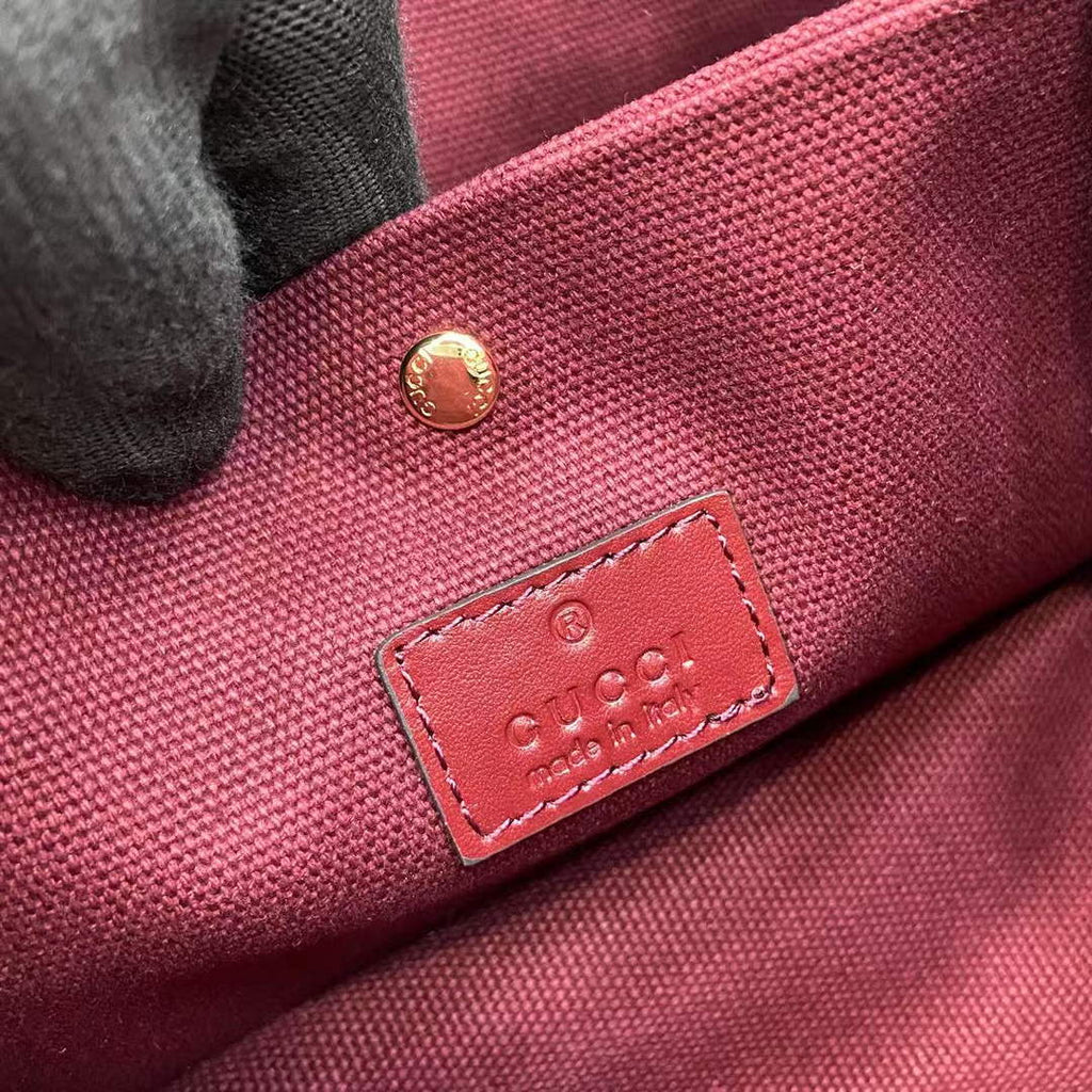Gucci GG Emblem small bucket bag 815118 in GG wine red leather