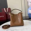 Gucci GG Emblem small bucket bag 815118 in GG brown leather