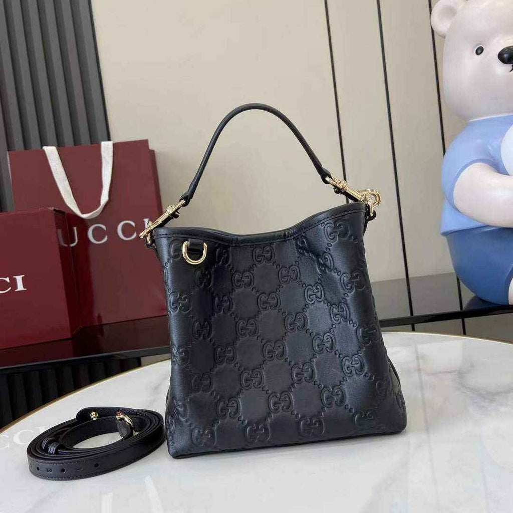 Gucci GG Emblem small bucket bag 815118 in GG black leather