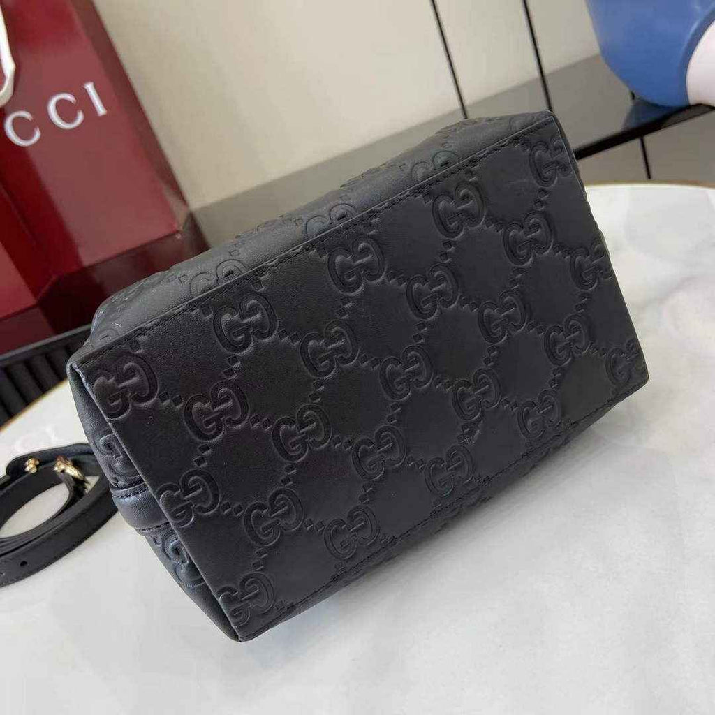 Gucci GG Emblem small bucket bag 815118 in GG black leather