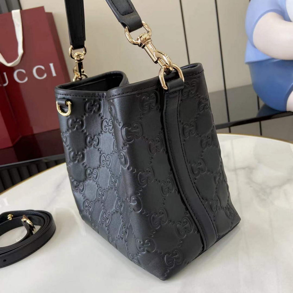Gucci GG Emblem small bucket bag 815118 in GG black leather