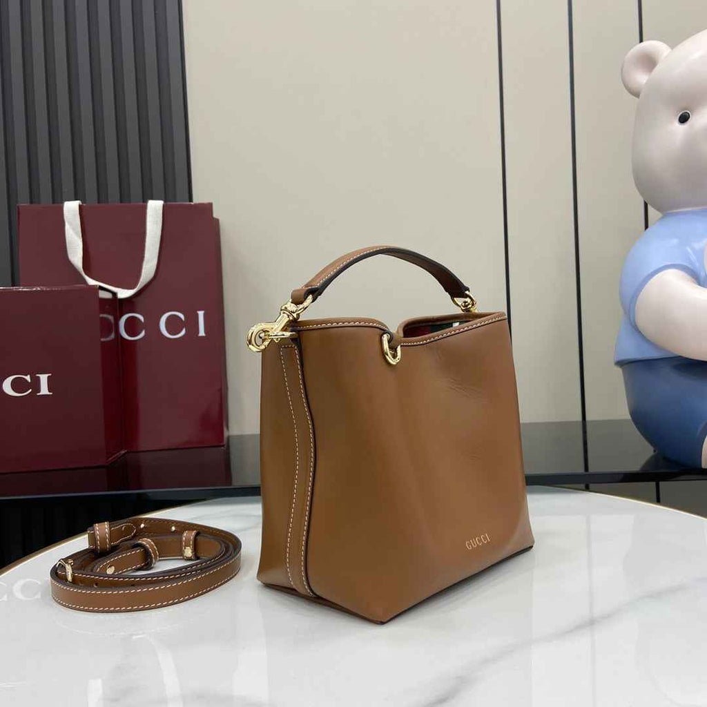 Gucci GG Emblem small bucket bag 815118 in brown leather