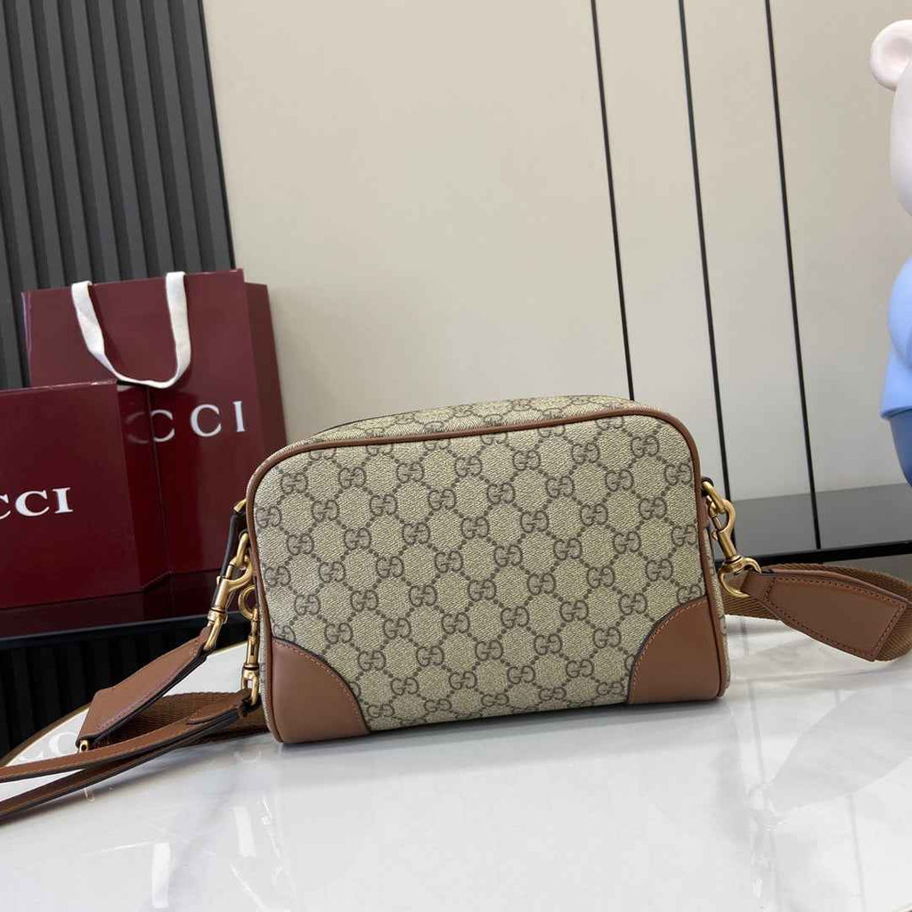 Gucci GG Emblem small crossbody bag, 821155 in brown fabric