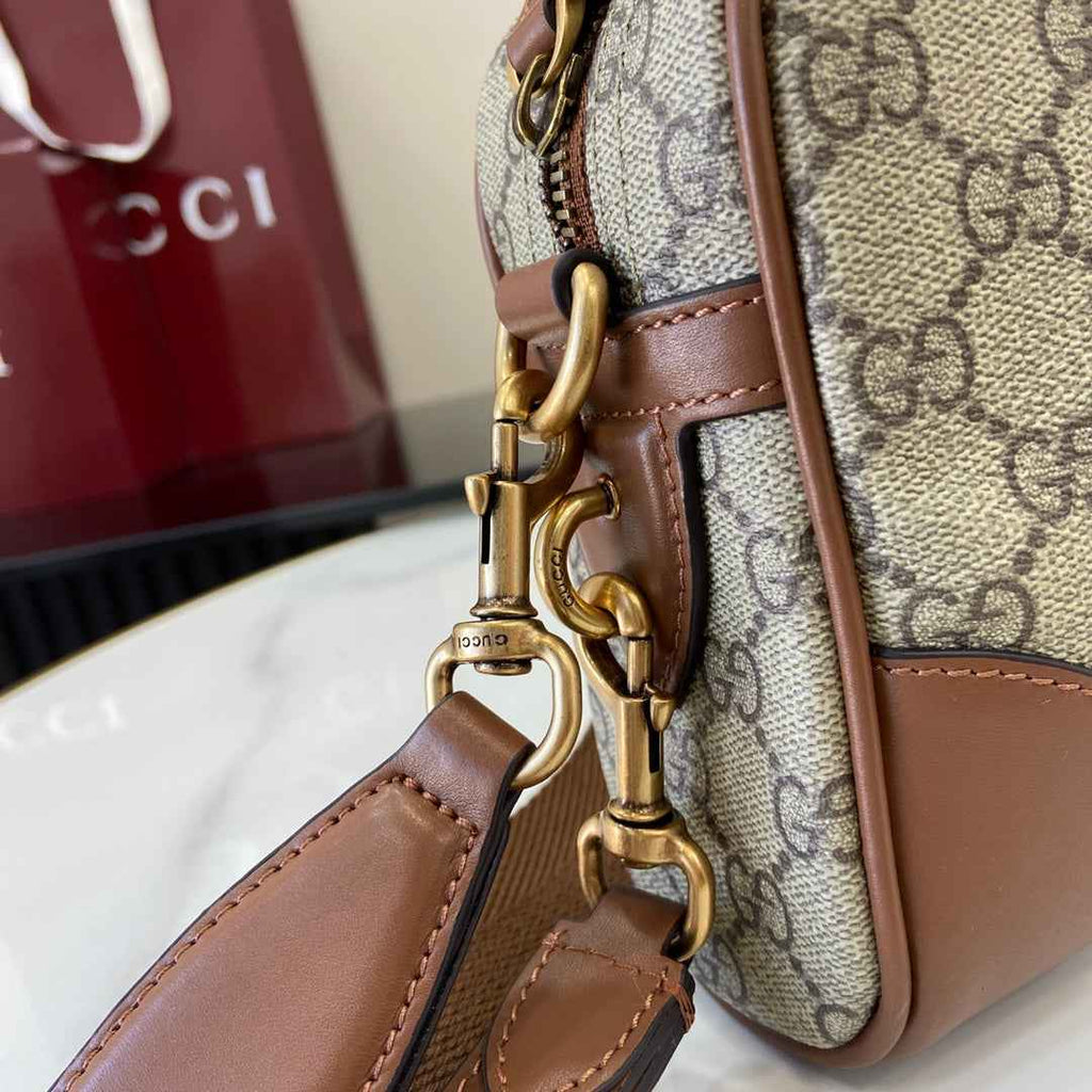 Gucci GG Emblem small crossbody bag, 821155 in brown fabric