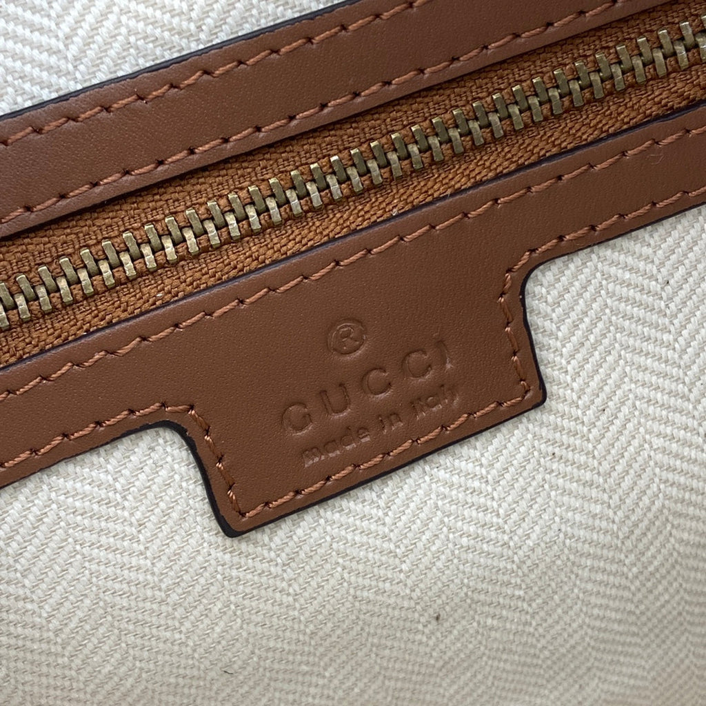 Gucci GG Emblem small crossbody bag, 821155 in brown fabric