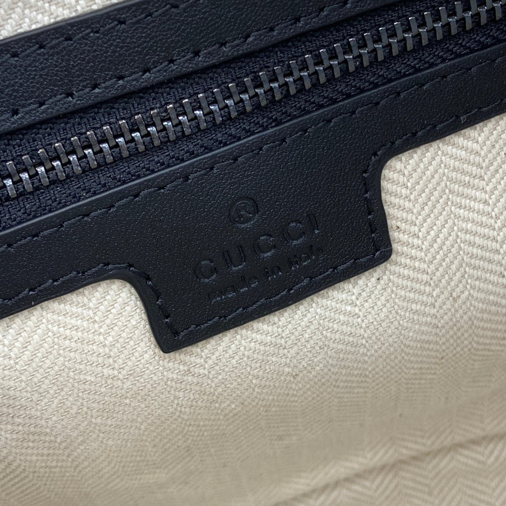 Gucci GG Emblem small crossbody bag, 821155 in black fabric