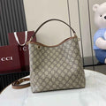 Gucci GG Emblem medium bucket bag ‎815103 in brown fabric