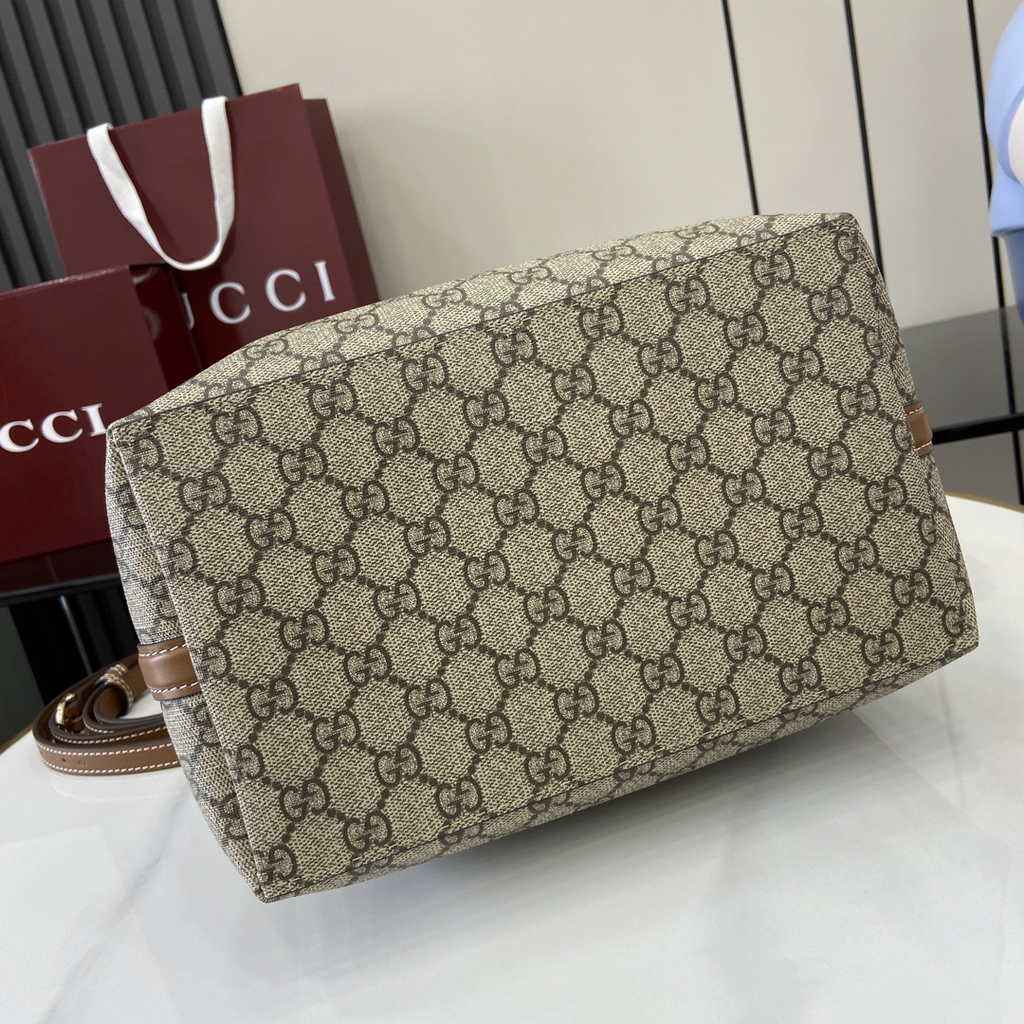 Gucci GG Emblem medium bucket bag ‎815103 in brown fabric