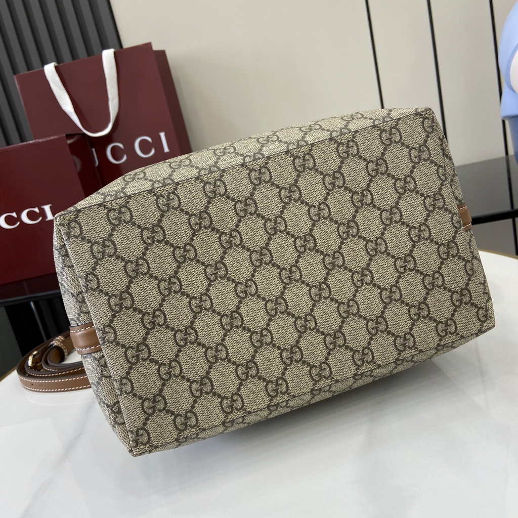 Gucci GG Emblem medium bucket bag ‎815103 in brown fabric