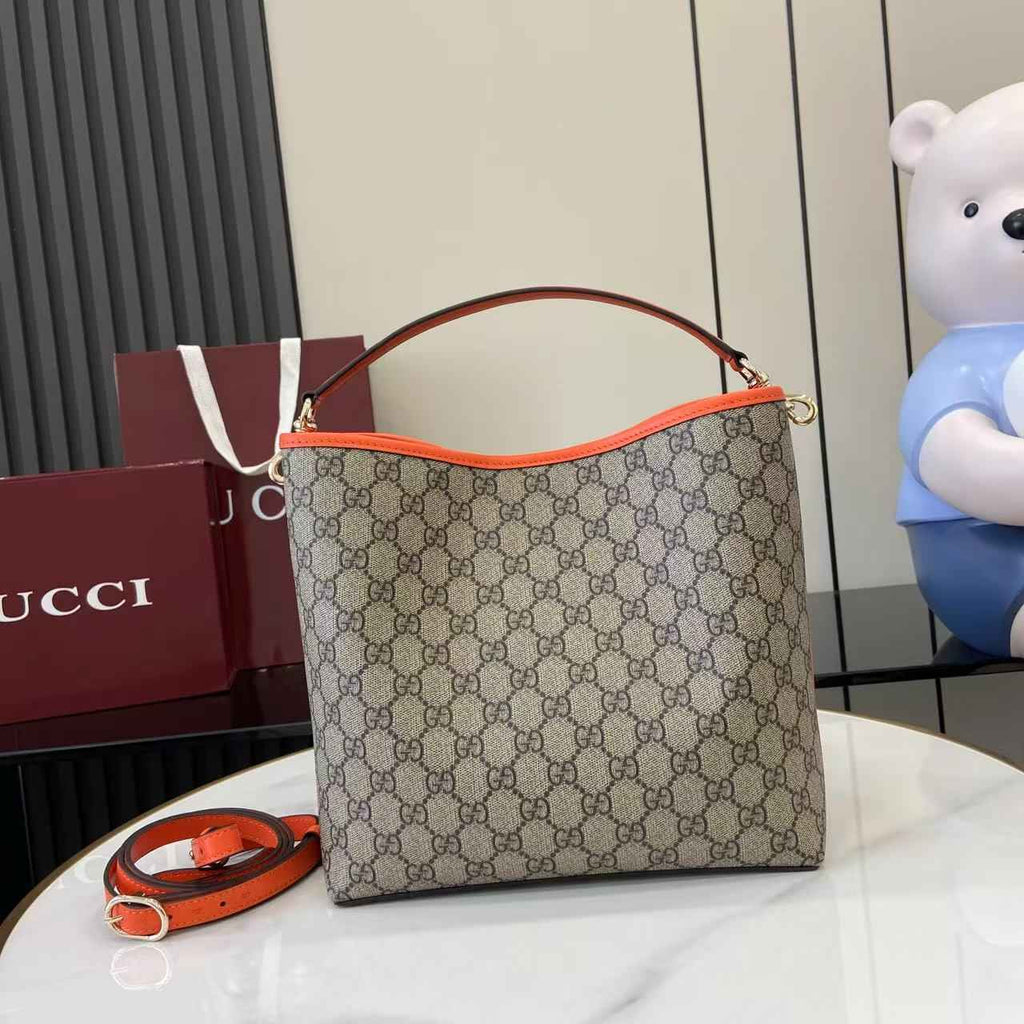 Gucci GG Emblem medium bucket bag ‎815103 in orange fabric