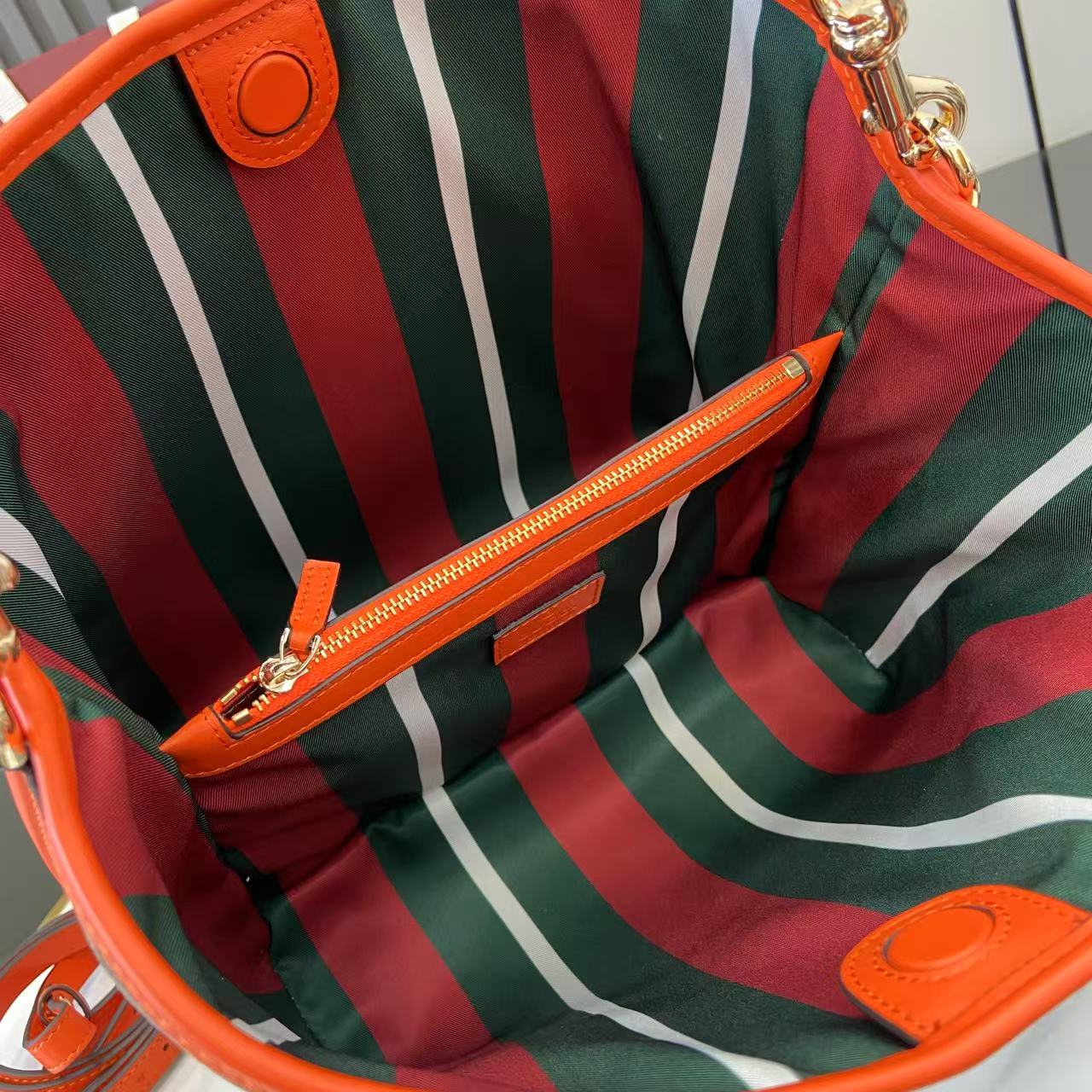 Gucci GG Emblem medium bucket bag ‎815103 in orange fabric