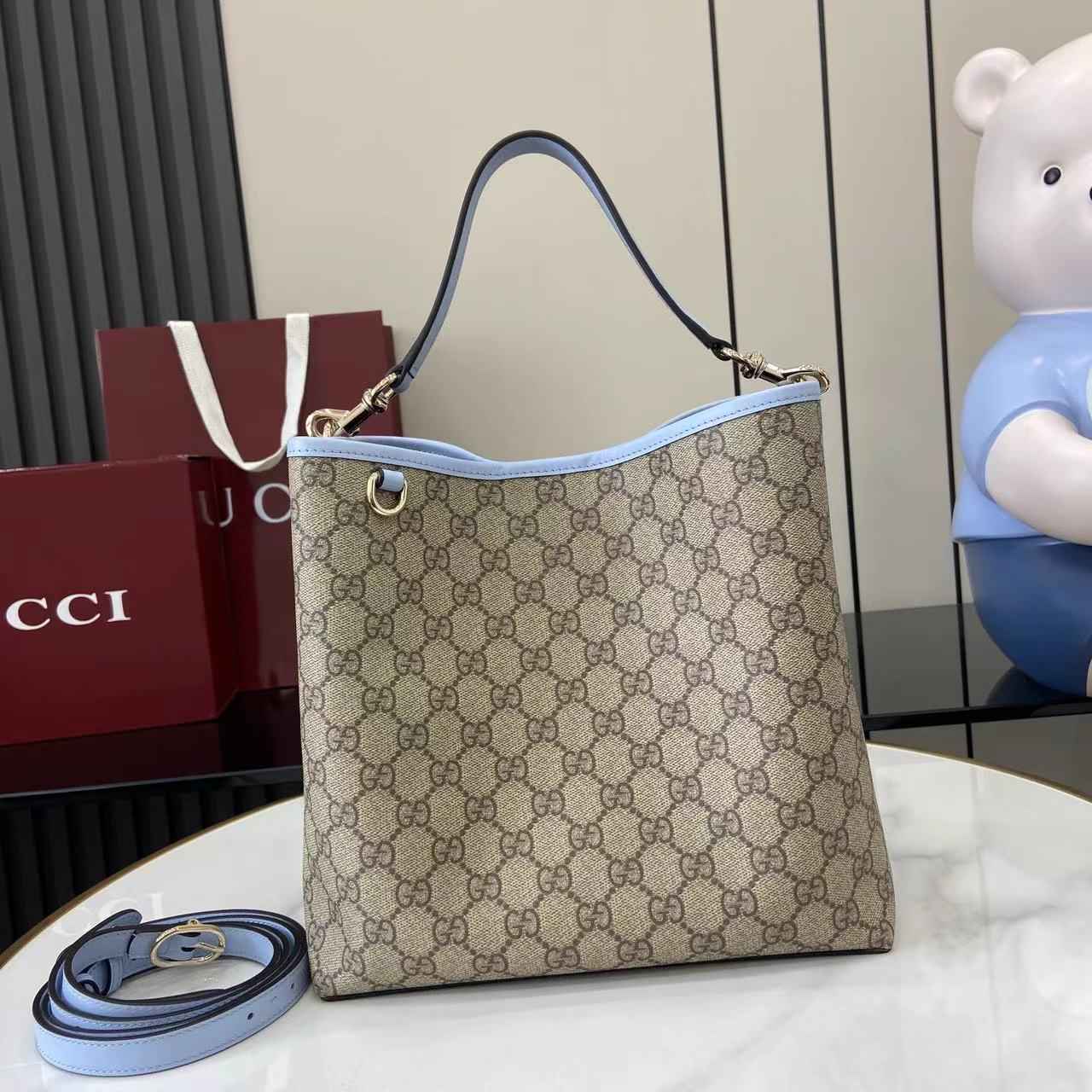 Gucci GG Emblem medium bucket bag ‎815103 in blue fabric